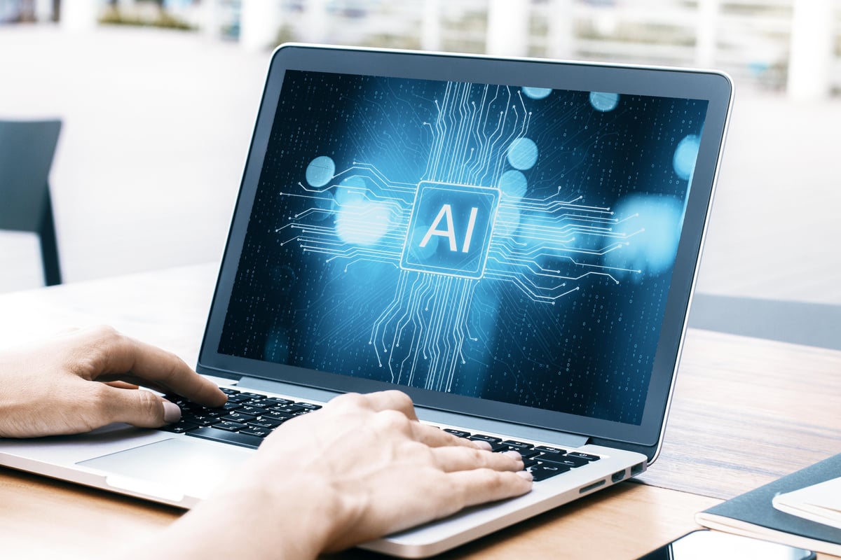 AI and technology designs on a laptop