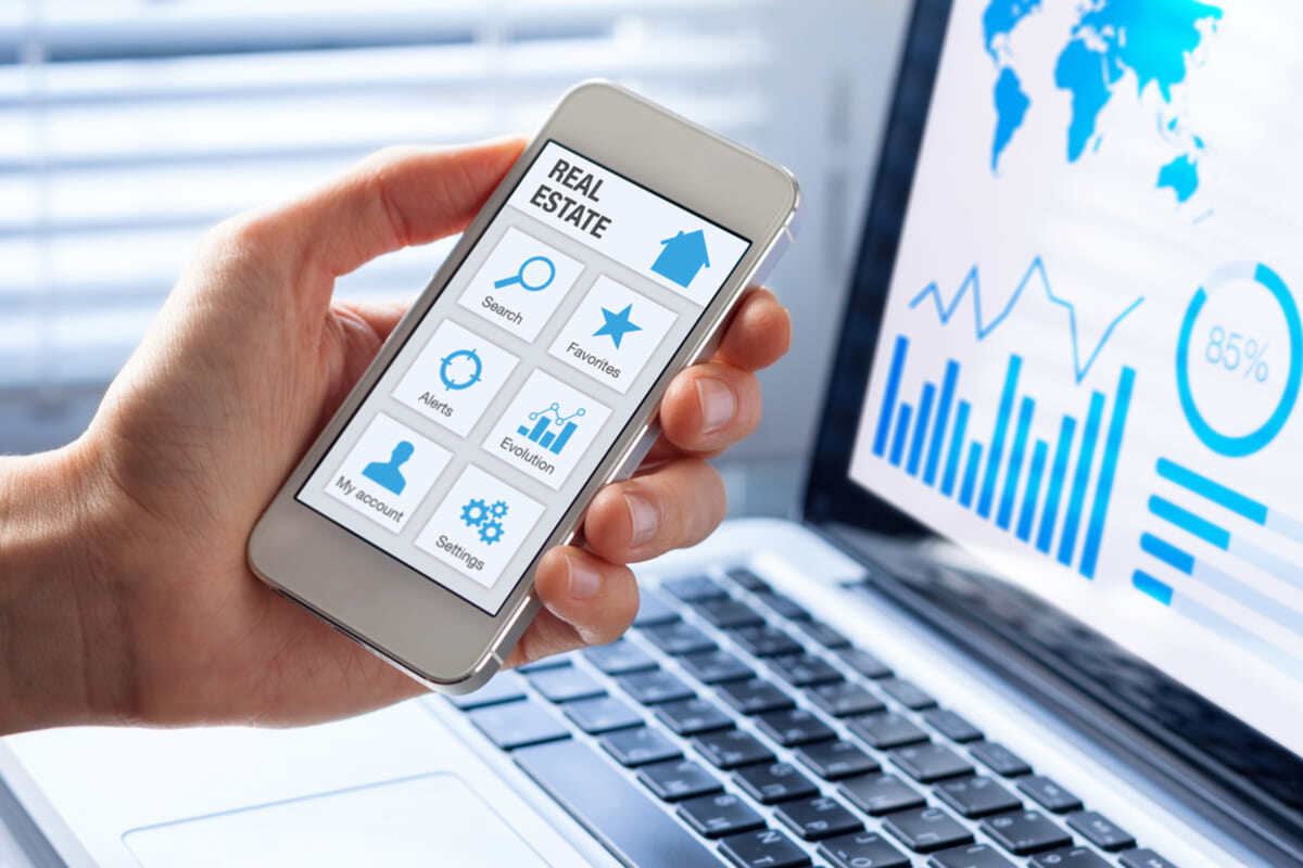 Property management technology on a phone and laptop