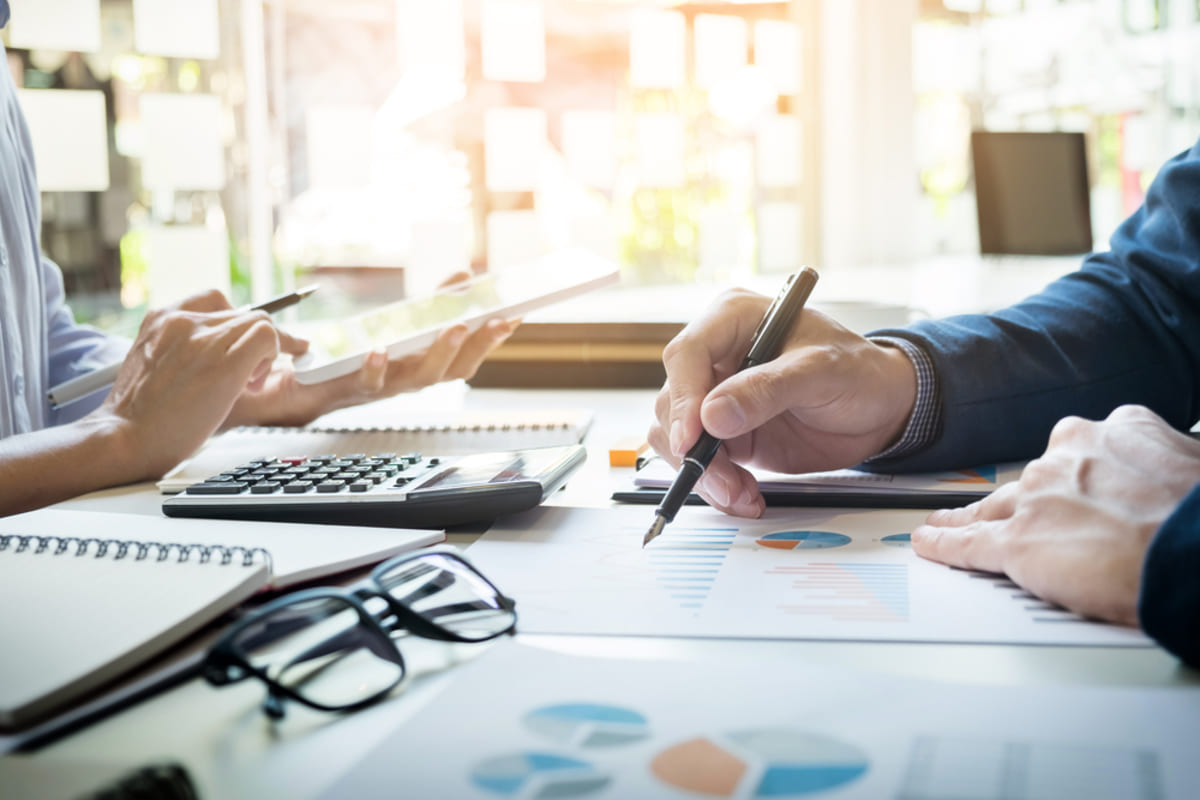 Two people looking at data and analytics
