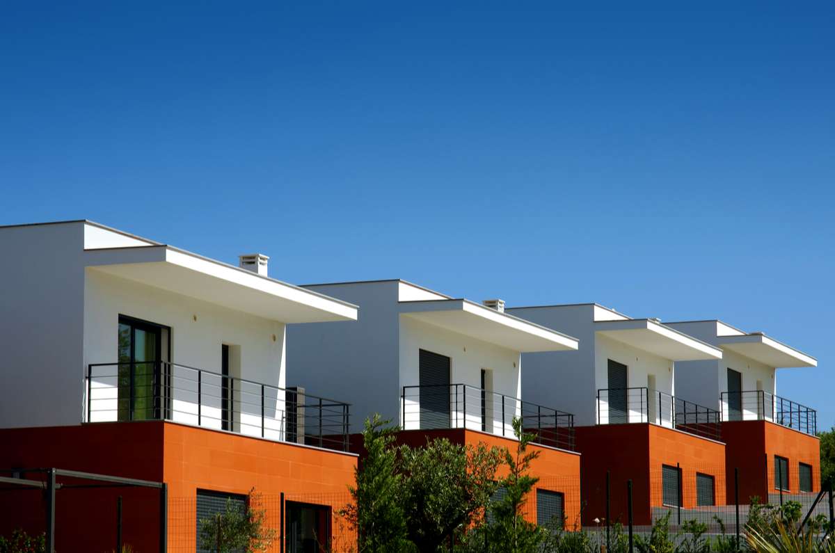Facades of a modern houses condominium (R) (S)