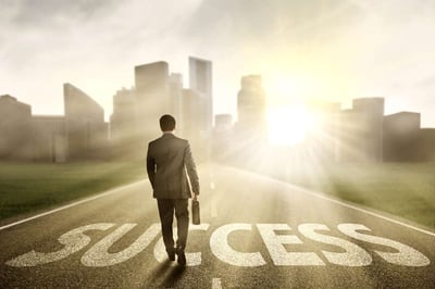 Man walking to a path of success