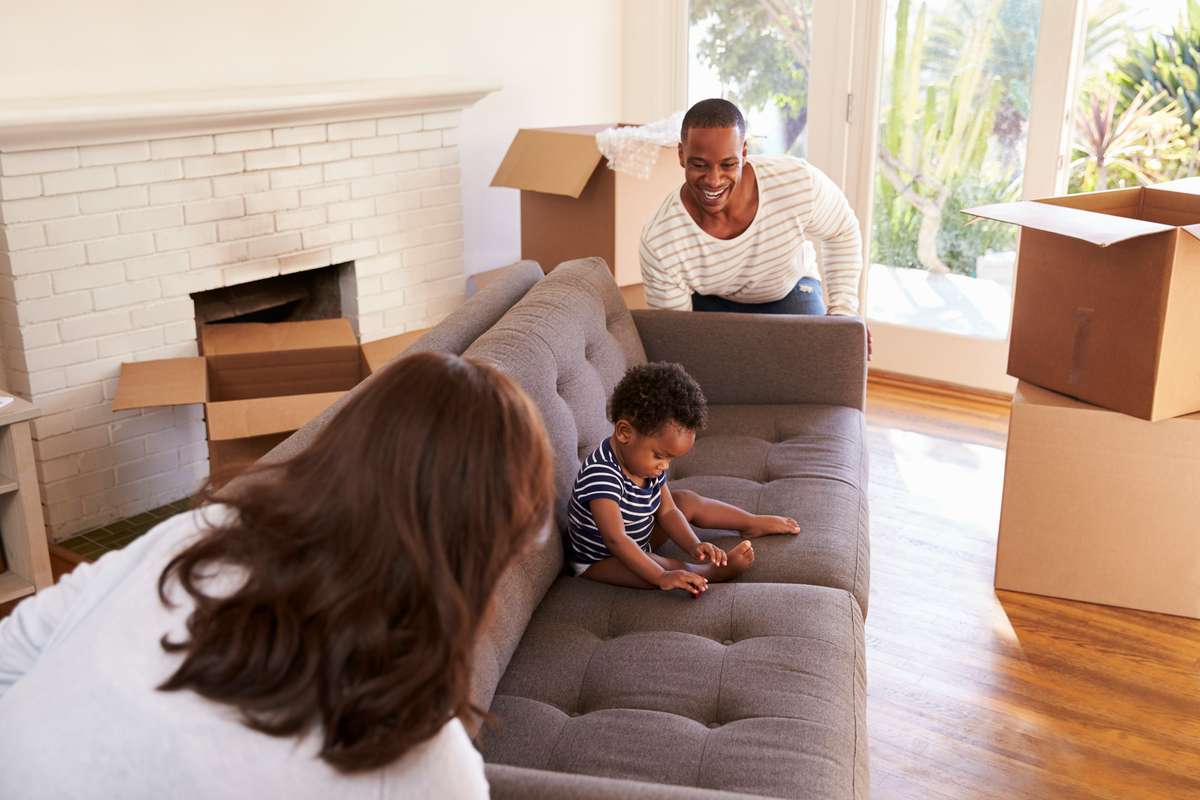 Parents Carry Son On Sofa (R) (S)