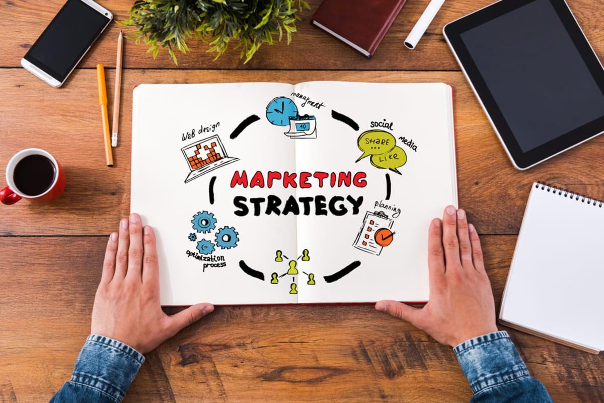 Marketing Strategy written in a notebook