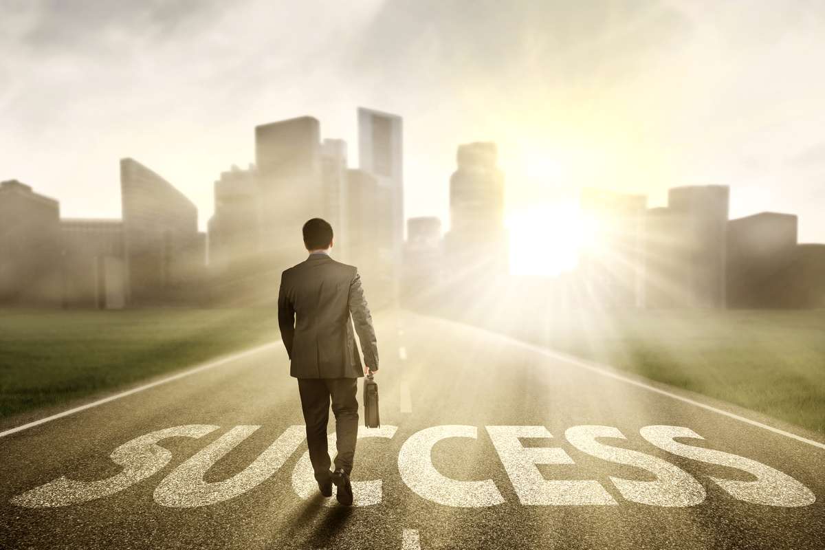 Man walking to a path of success