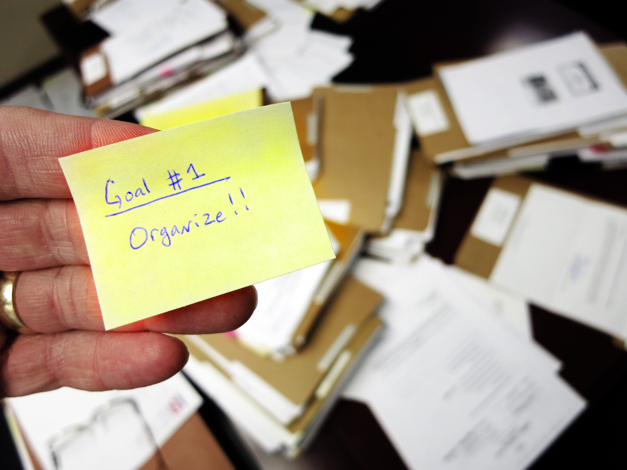 Goal written on a yellow post-it