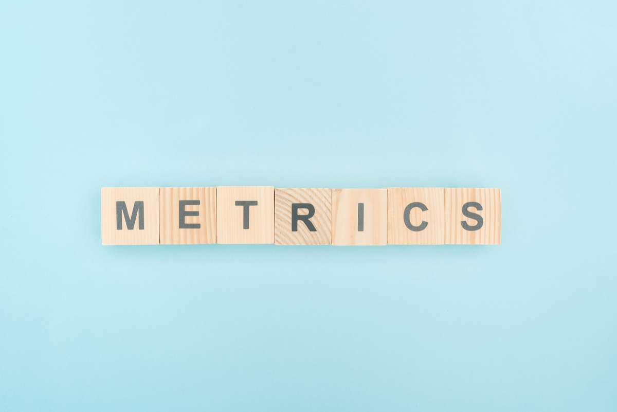 The words metrics spelled out using wooden tiles