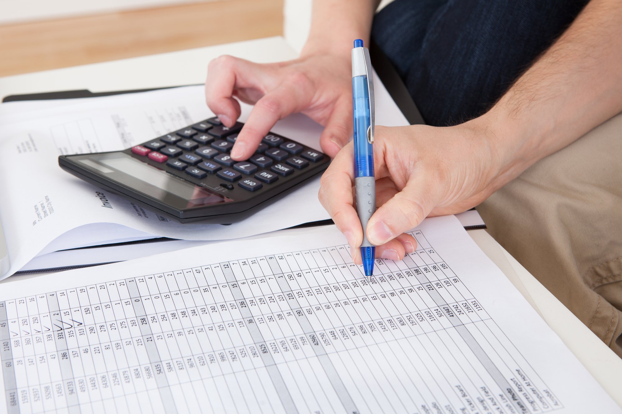 Calculating expenses with a calculator