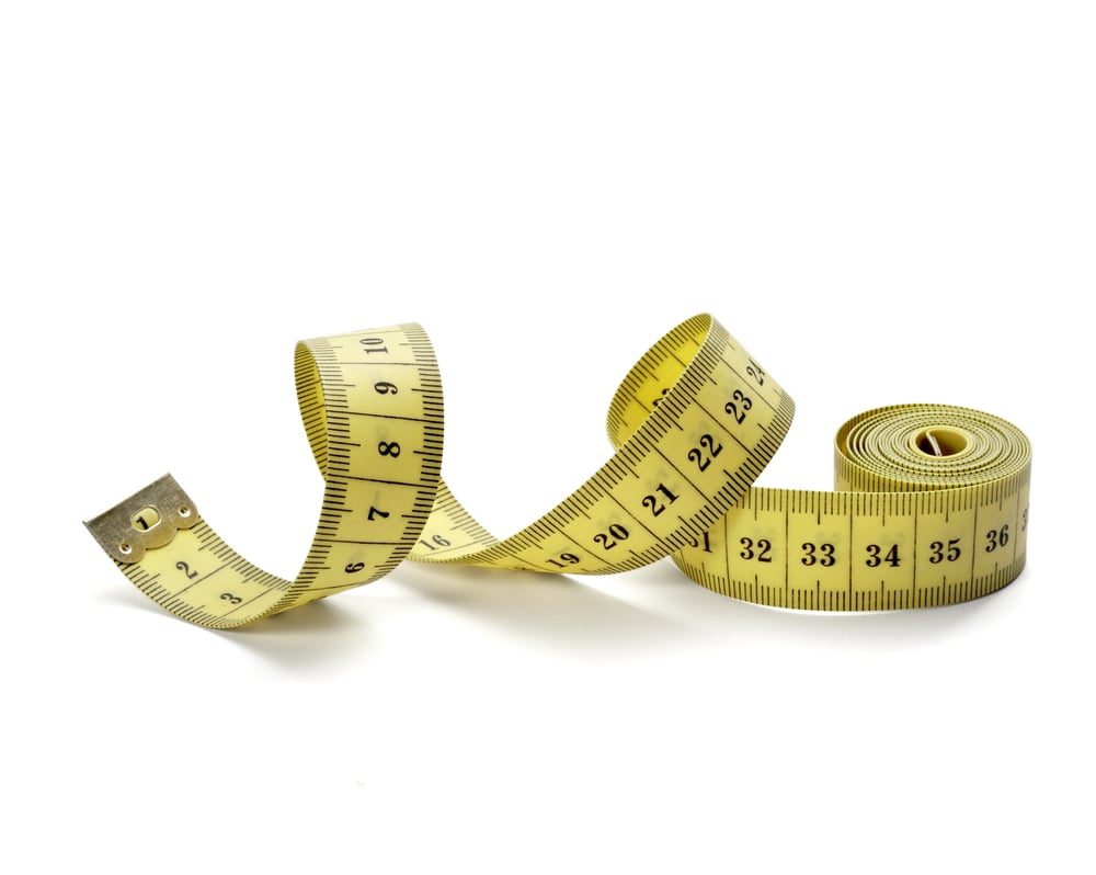 Measuring tape measuring success, property management metrics concept